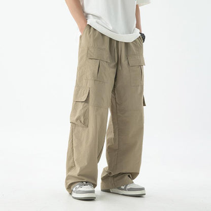 Men's Solid Loose Multi-pocket Elastic Waist Cargo Pants 73317666Z